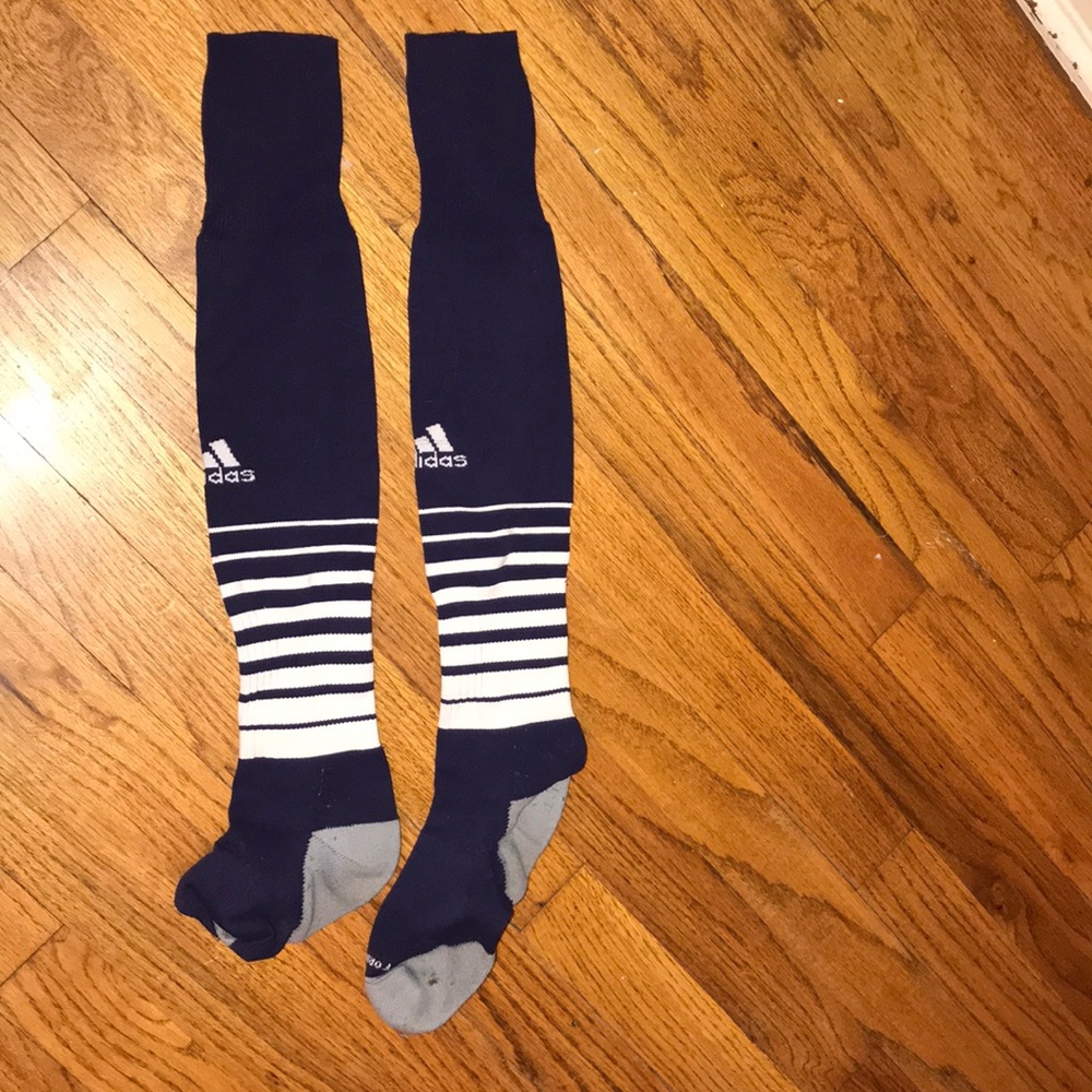 navy blue adidas sock with white stripes